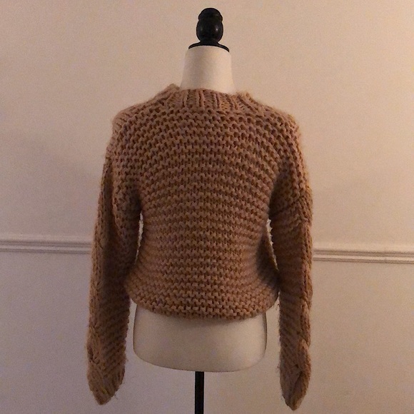 This is a MINKPINK x-small, acrylic sweater. It is lightly worn. - Picture 2 of 3